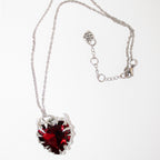 collier pendentif Hidden Track